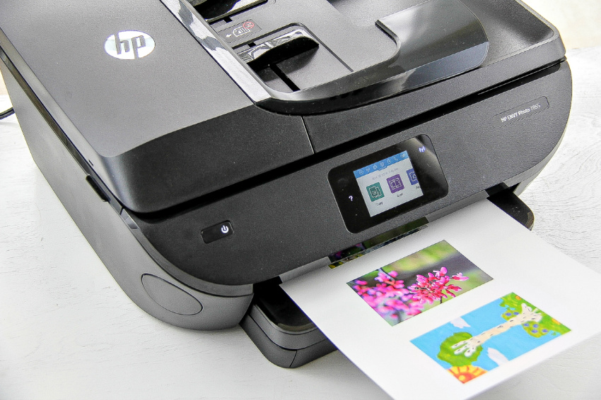 images being printed on a HP printer to be transferred onto leather