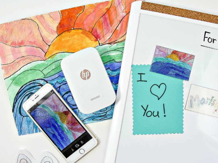 Tips for using a HP Sprocket to shrink kids artwork and turn it into magnets to display on whiteboards and the refrigerator.