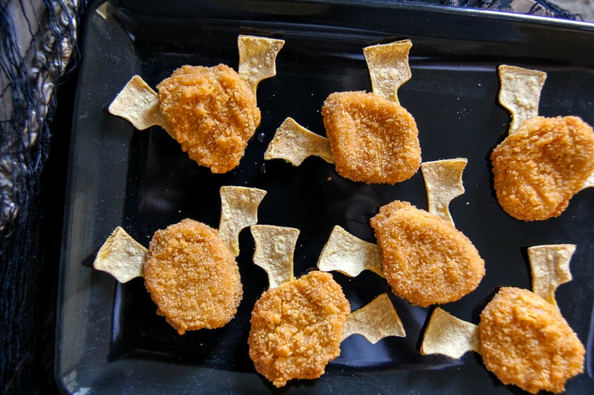 Chicken nuggets that look like bats for a Halloween party.