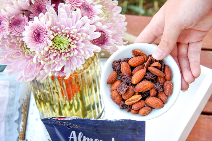 Blue Diamond Almonds & Fruit Fiery Ghost Pepper & Tart Cherry on a small tray for entertaining.