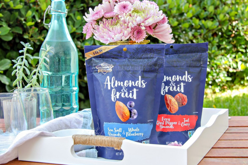 Blue Diamond almonds and fruit snacks on a serving tray.