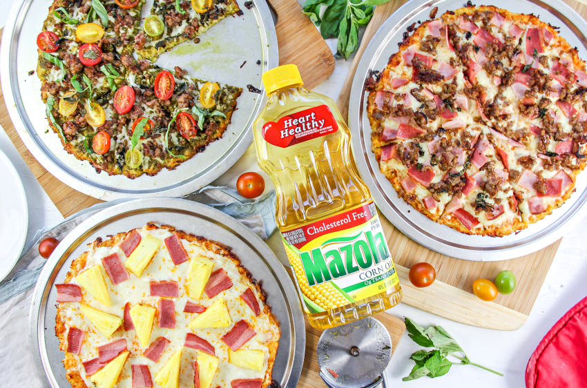 Cauliflower pizzas with a variety of different toppings.