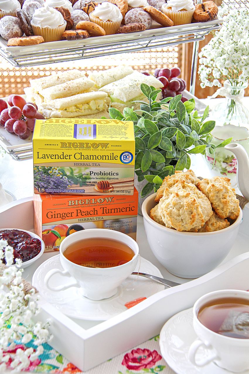 Afternoon tea party table idea with tea, scones, and jam.