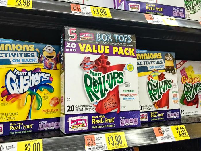 fruit roll-ups and gushers on a store shelf