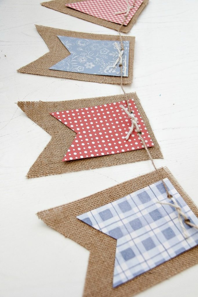 a 4th of July garland made with burlap and scrapbook paper