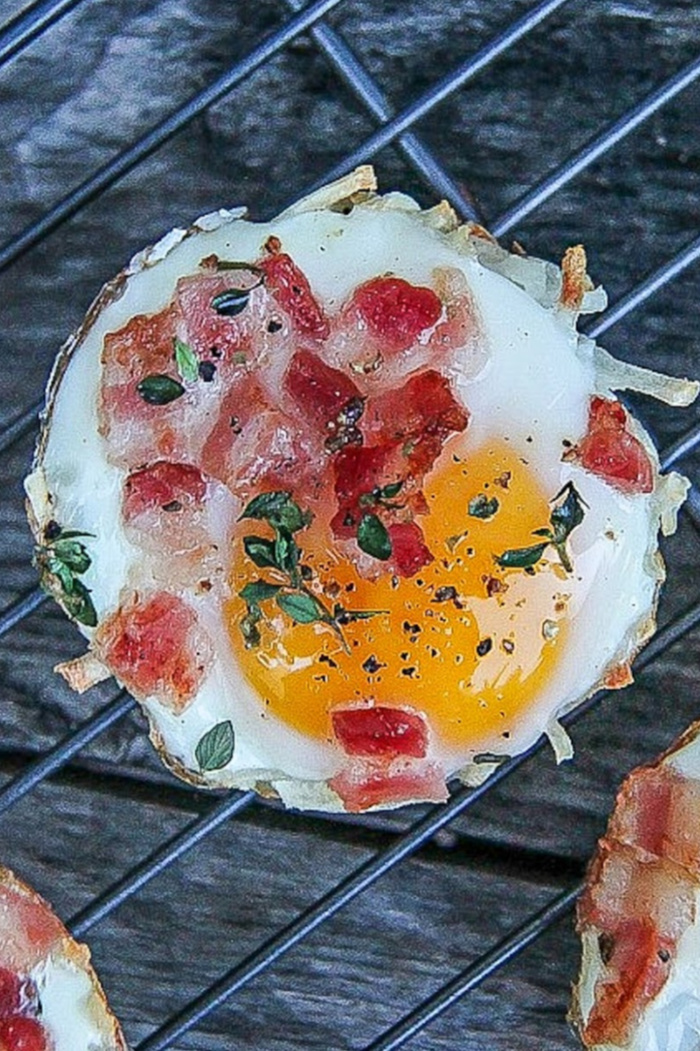 Hash brown nests with bacon and egg.