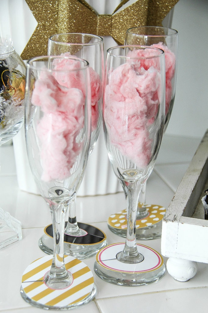 pink cotton candy inside champagne glasses