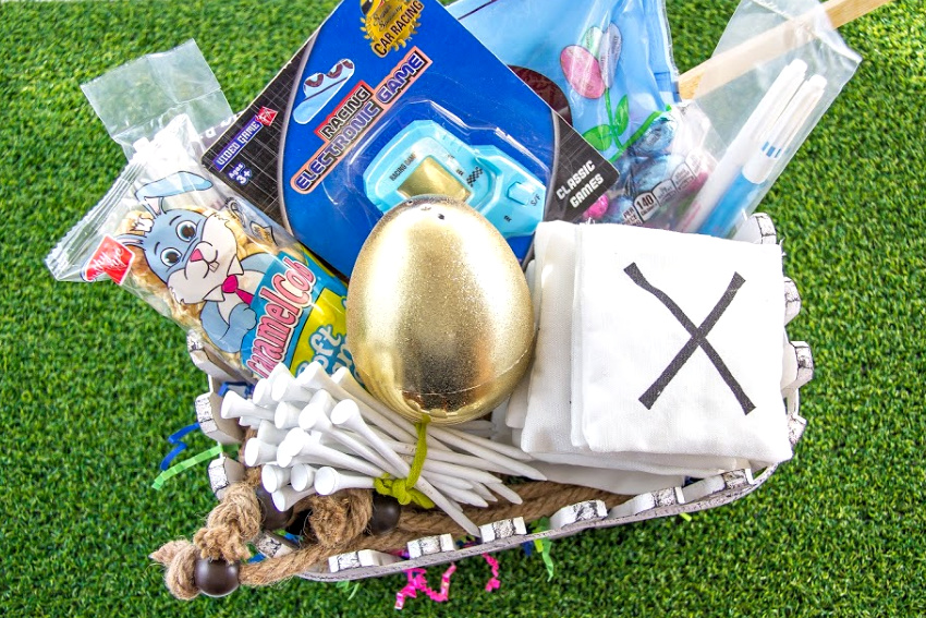 Easter basket filled with games, snacks, and golf tees for a teenage boy