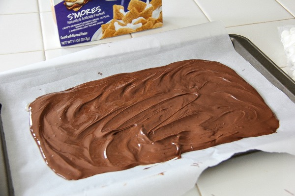 melted chocolate spread on parchment paper on a tray