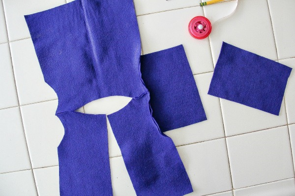 sewing steps for making a coat for a bear using blue felt