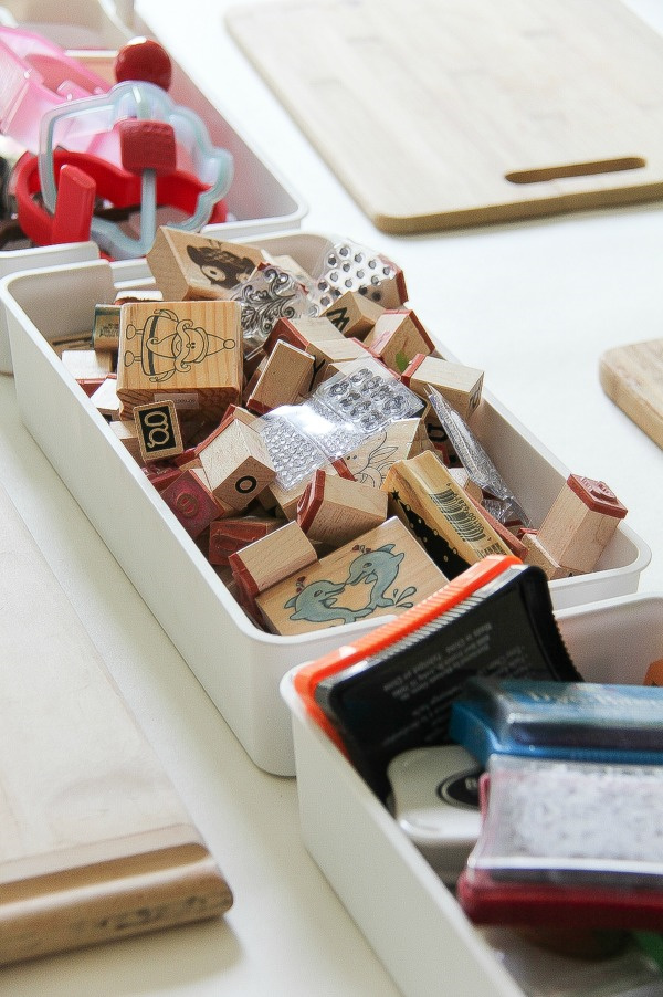 stamps in a container for crafting