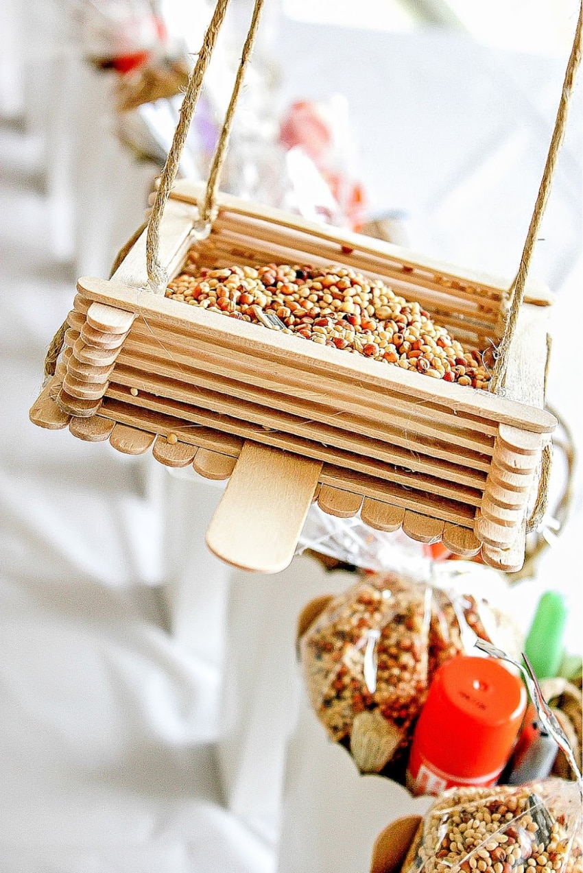 bird feeder made out of popsicle sticks