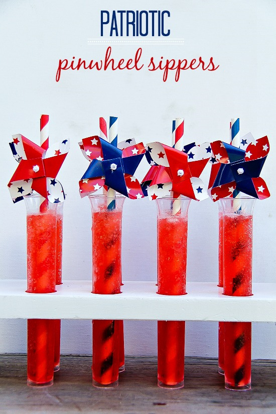 red drinks in test tubes with red blue and white pinwheel straws