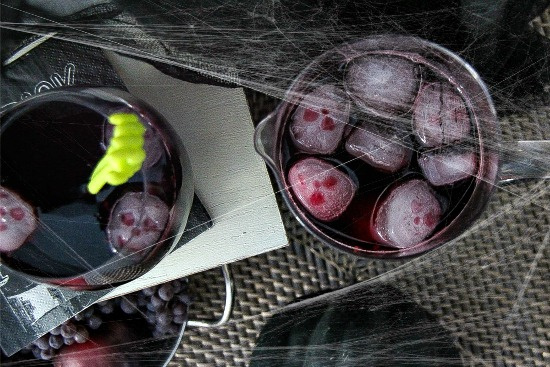 red wine with skull ice cubes for halloween