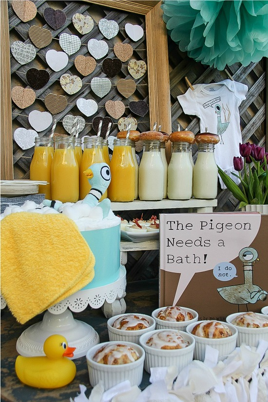 a book themed baby shower table inspired by Mo Willems the pigeon needs a bath