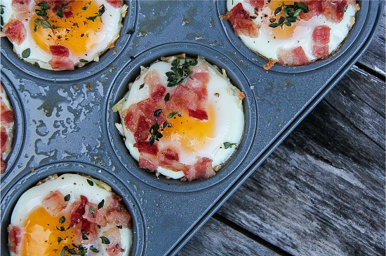 hash browns, egg, and bacon baked in muffin tins in the oven