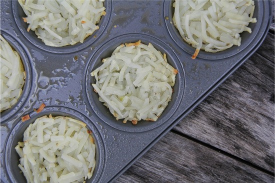 hash browns pressed into muffin tins