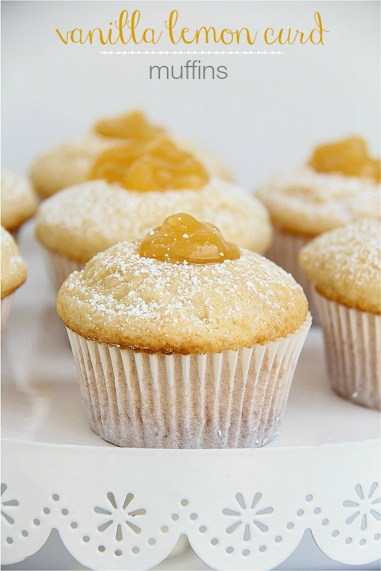 vanilla lemon curd muffins on a white cake stand