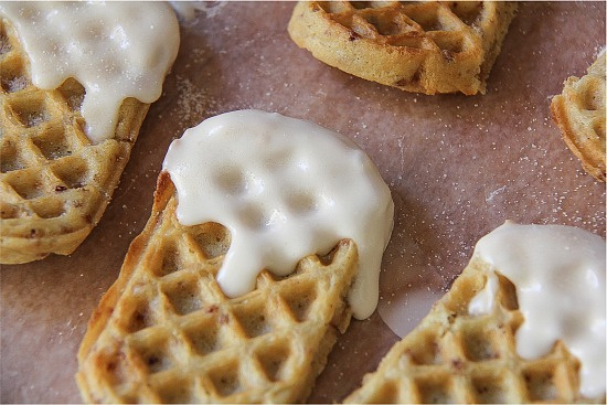 waffle sticks dipped in icing and cinnamon sugar