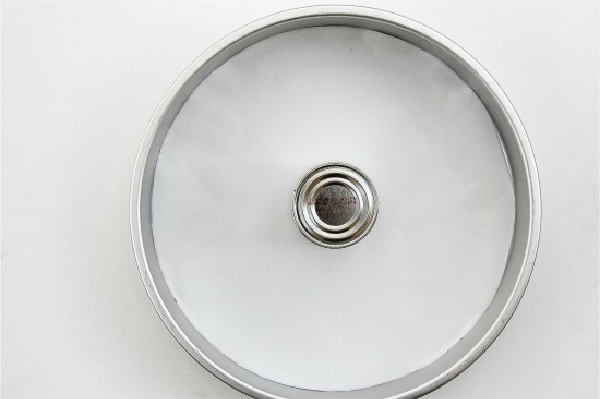 a cake pan with a tin can in the middle to make an angel food cake