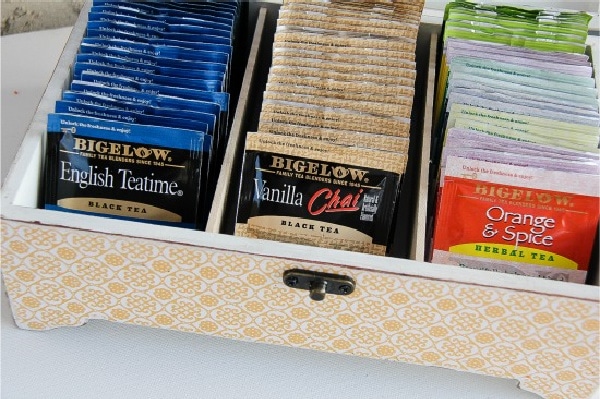 a handmade tea storage box filled with tea