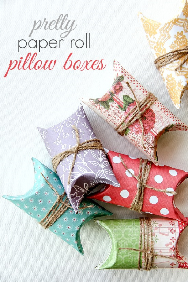 paper rolls wrapped in scrapbook paper and twine to make gift packages