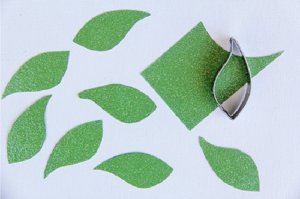 green glitter leaves cut out of card stock