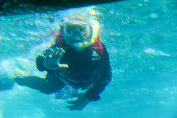 boy snorkeling great barrier reef