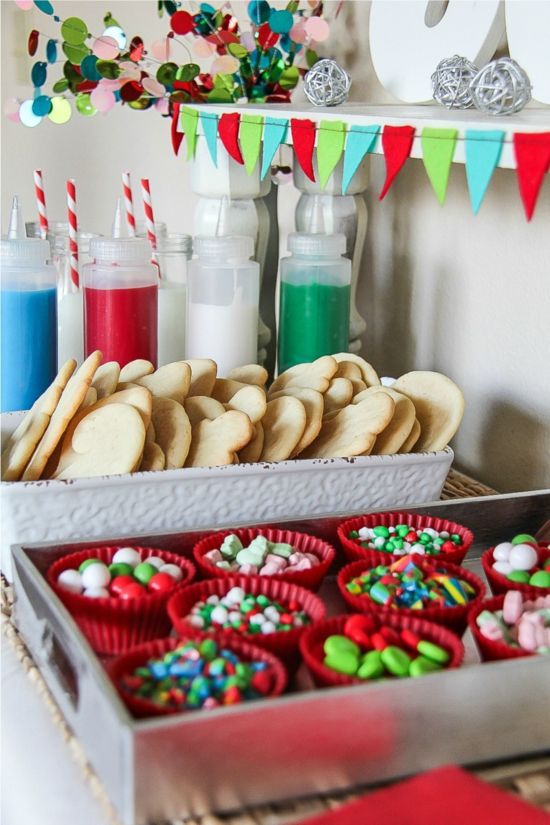 trays and bottles for decorating Christmas cookies