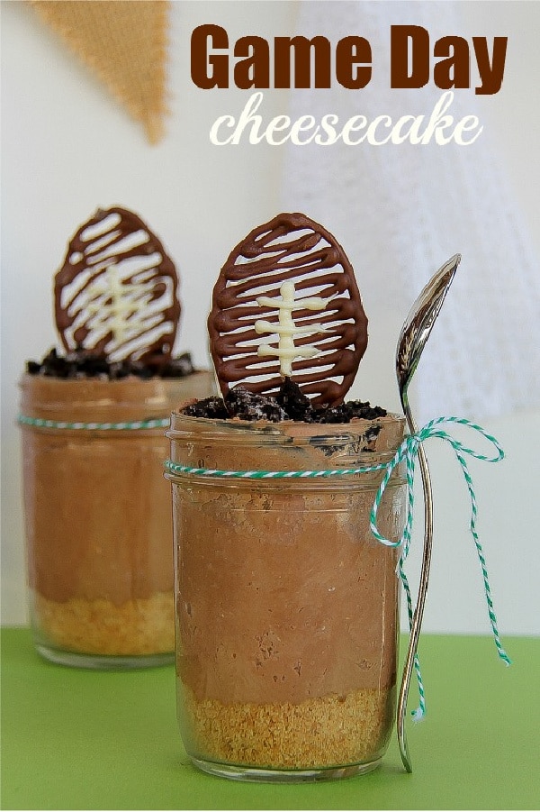 chocolate cheesecake in a jar topped with a chocolate football