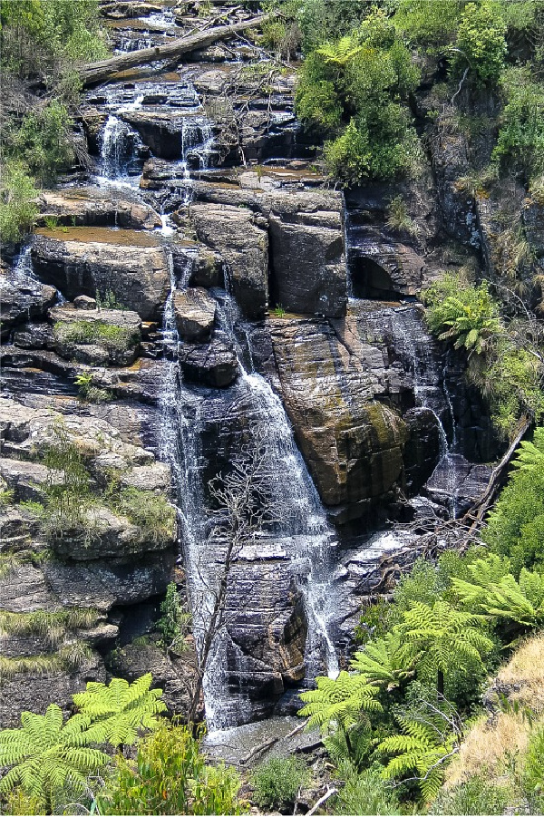 water cascading over rocks at masons falls in kinglake national park victoria australia