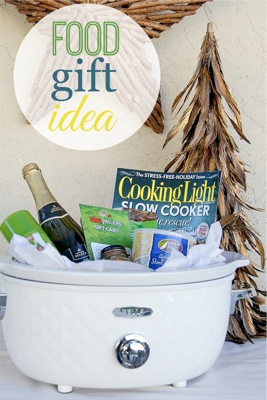 a slow cooker filled with food and wine for gift