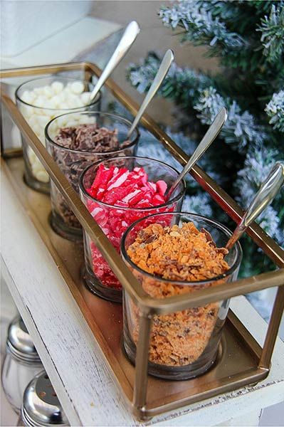 hot cocoa bar toppings in glasses