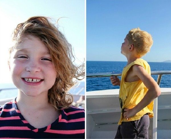 kids on a catamaran