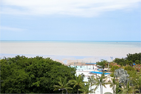 view over the ocean in cairns at low tide from The Mantra