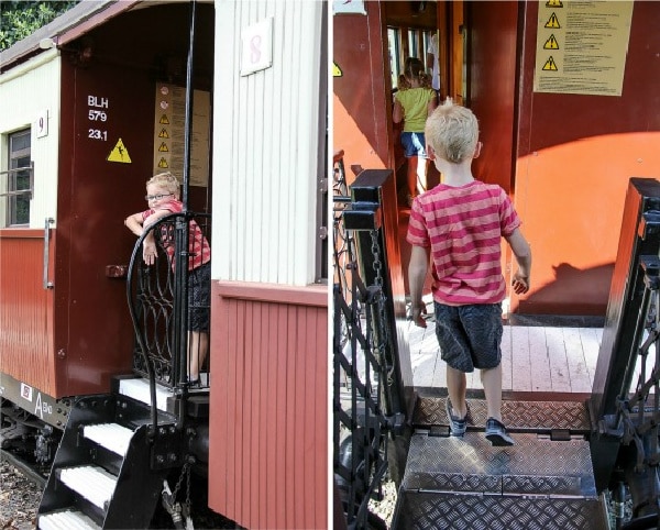 kids walking between train carriages