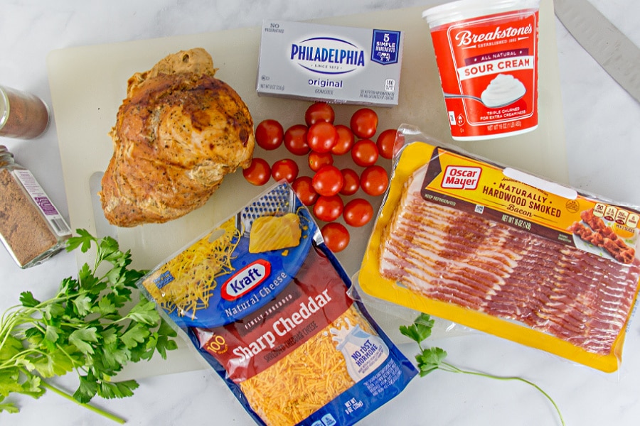 Ingredients laid out on a counter for making a Kentucky Hot Brown dip.