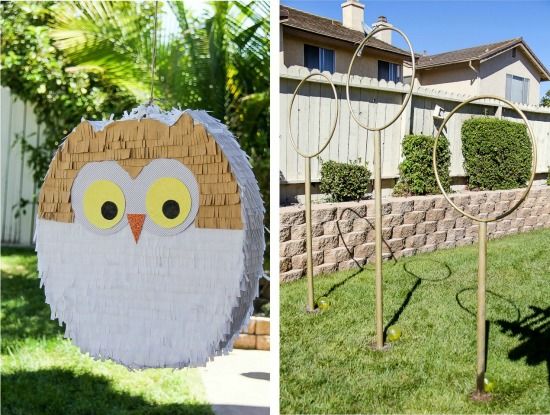 Harry Potter owl pinata and quidditch hoops in a backyard for a party.