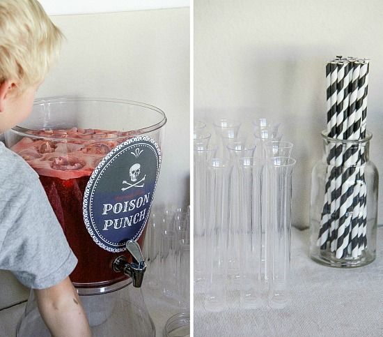 Poison punch served in a beverage dispenser, with test tubes and straws for a Harry Potter Halloween party