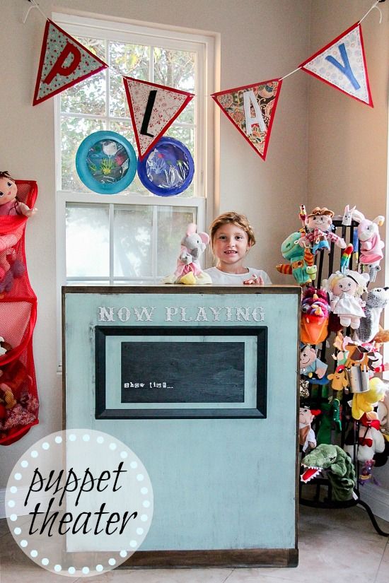 DIY puppet theater for kids made out of an old cabinet