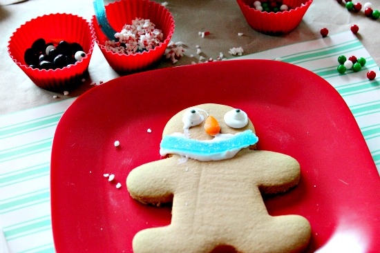 a gingerbread man cookie decorated with candy