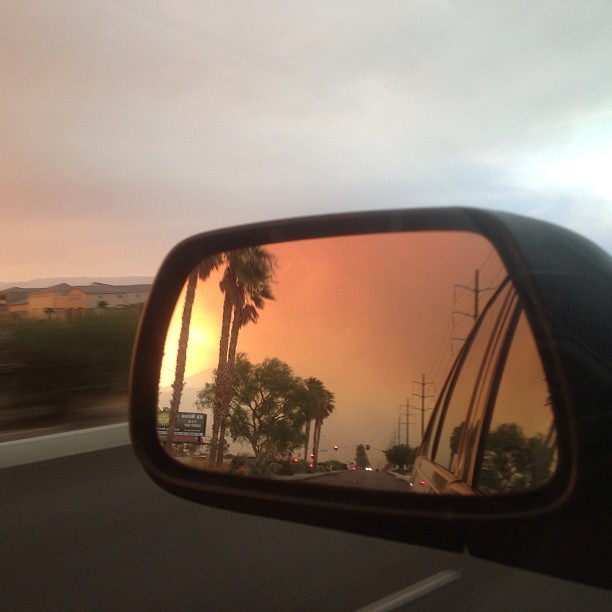 looking in the car mirror at the fires in the San Jacinto Mountains.