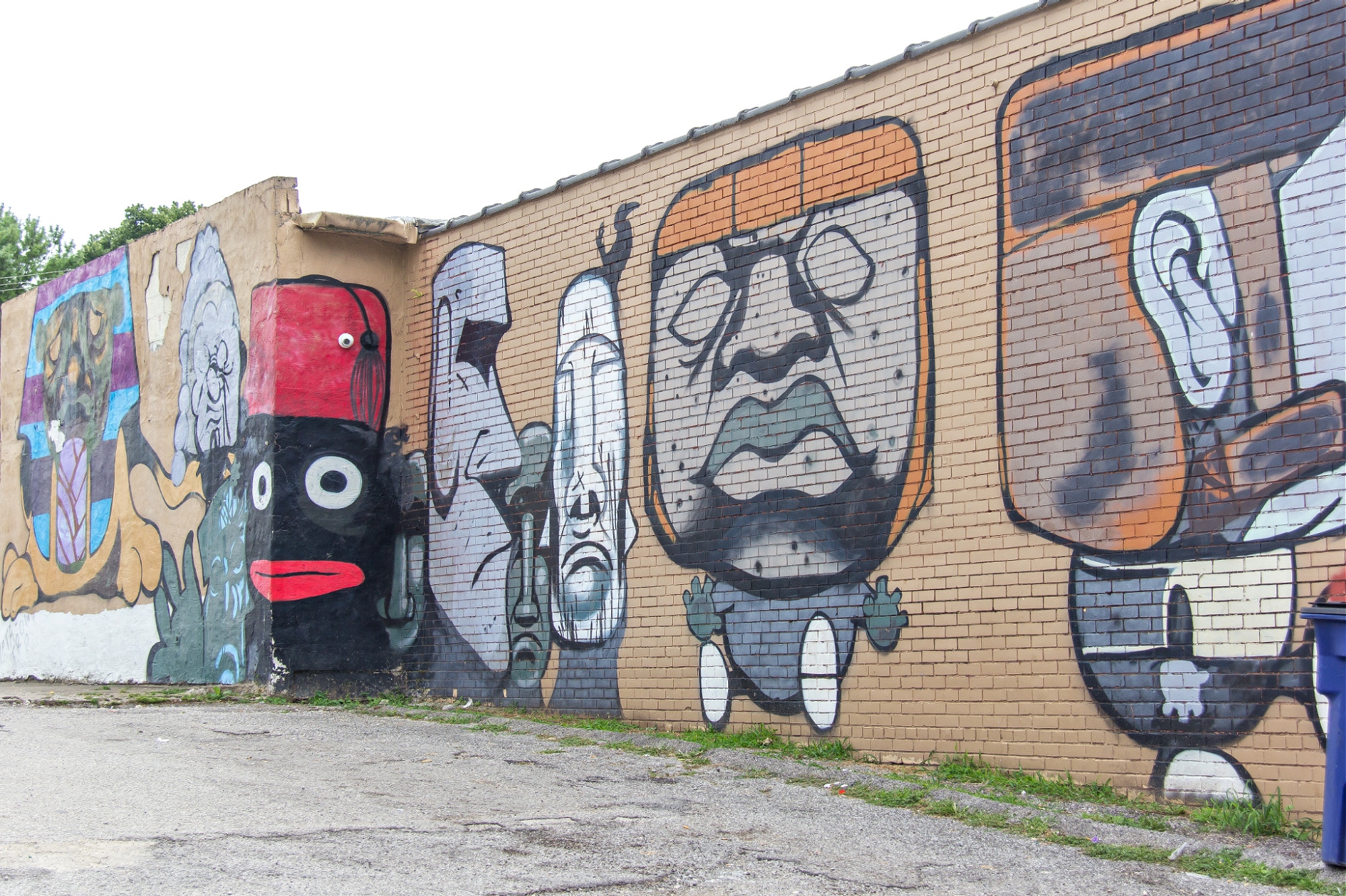 strange characters mural in lexington