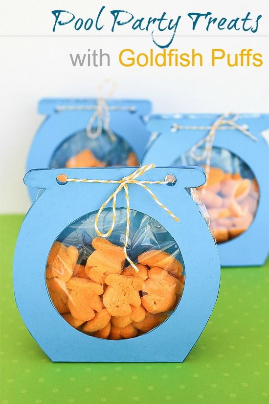 a blue paper fish bowl craft with a candy treat bag full of Goldfish inside