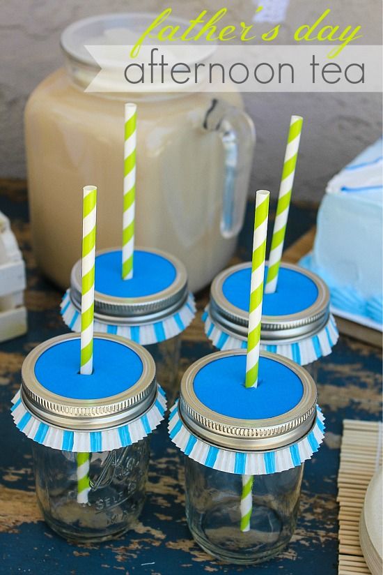 canning jars with baking cups and straws to keep bugs out of drinks
