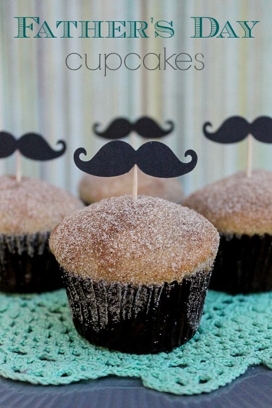 Cinnamon cupcakes with a mustache cupcake topper for Father's Day.