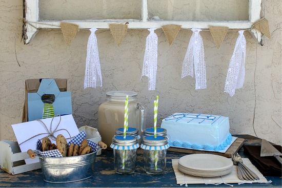 Father's Day afternoon tea table set up with cookies, iced coffee, and ice-cream cake.