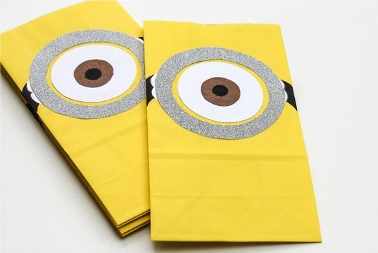 Yellow minion candy bags for a pinata.