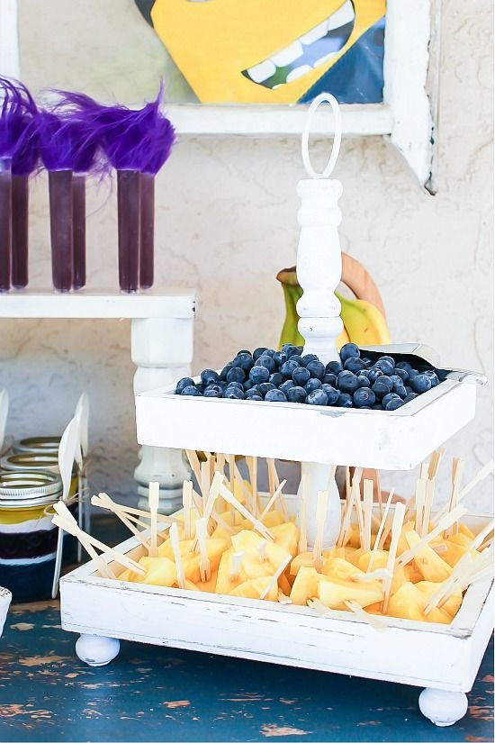 Pineapple, blueberries, and bananas for healthy Minion party treats.