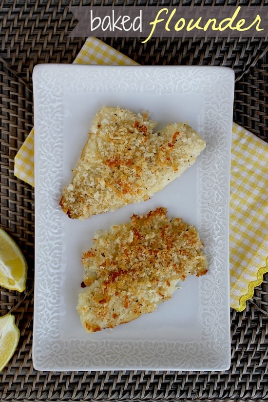 Crumbed baked flounder fillets on a white tray.